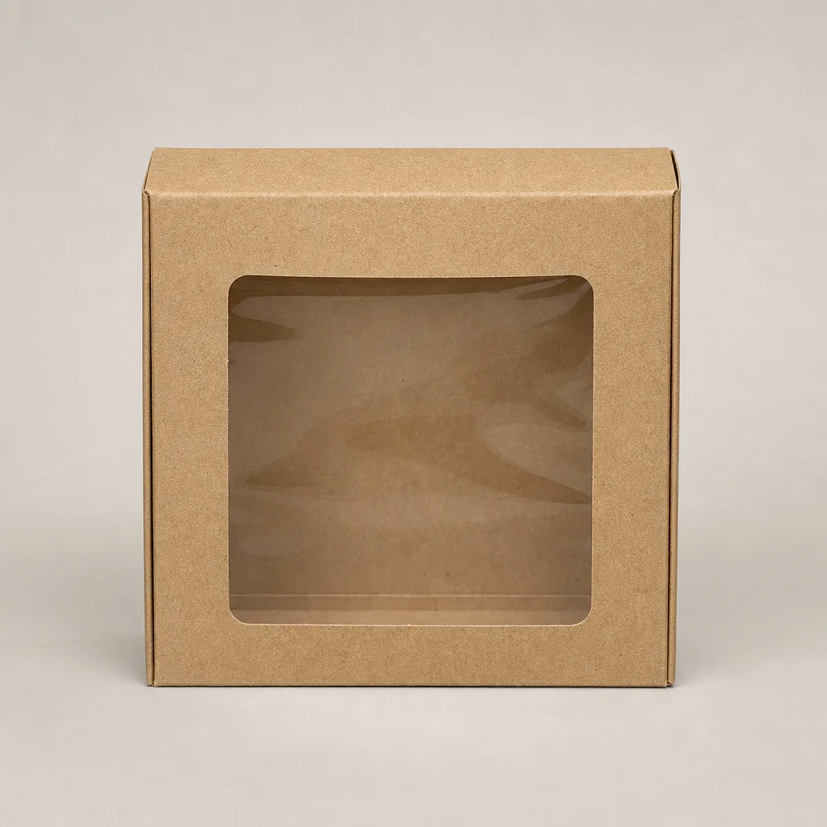 Kraft bakery box with a clear window showing a pastry